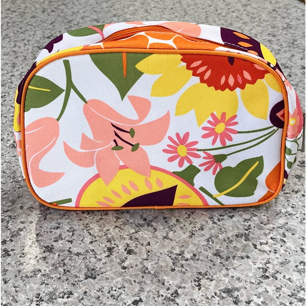 Clinique cosmetic bag, pretty floral lily pattern. Never used.
